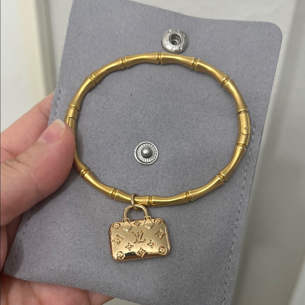 Louis Vitton gold Bracelet with Charm